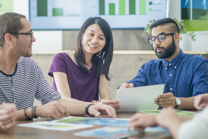 Photo: Organization analyzing data together